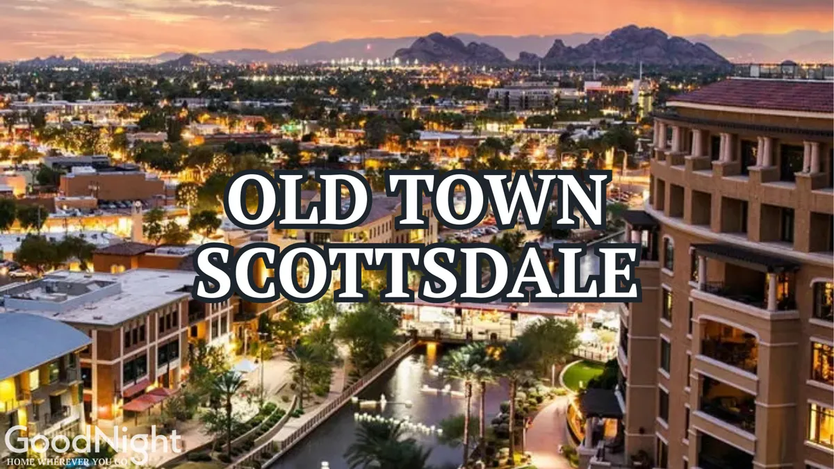 A lively view of Old Town Scottsdale, featuring the iconic sign, vibrant cityscape, and mountains in the distance. The scene is bustling with energy, highlighting shops, cafes, and local culture.